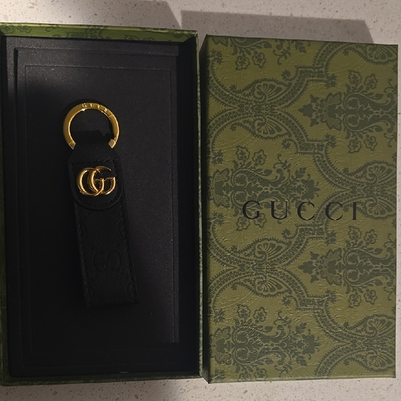 Gucci Black and Gold Keychain - Picture 1 of 2